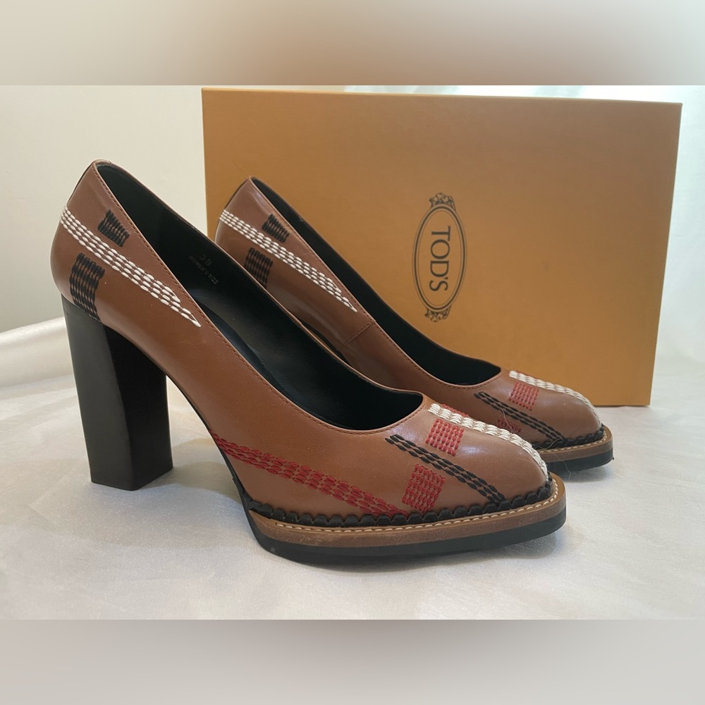 Tod’s brown leather pumps. Size 38. Includes original box, dust bag. No trade